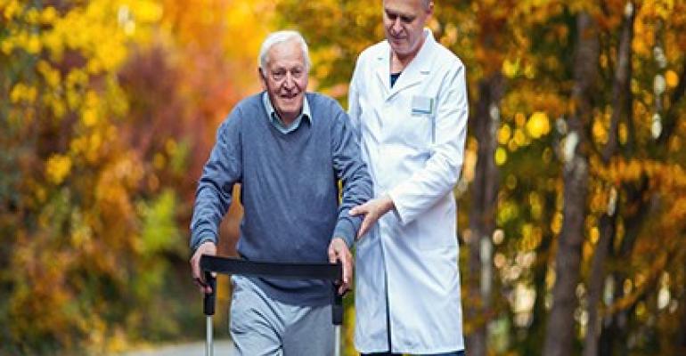 doctor guiding old person